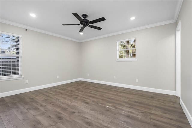 empty room featuring ceiling fan, dark hardwood / wood-style flooring, and crown molding