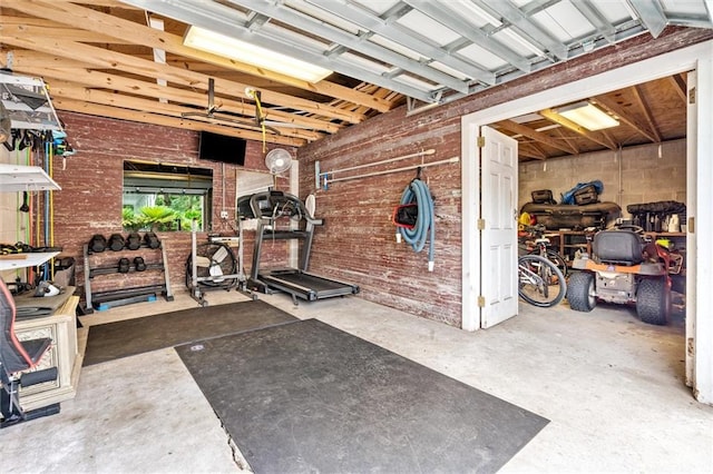 exercise room with brick wall