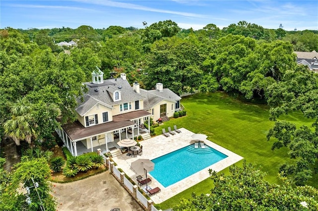 exterior space with a patio and a yard