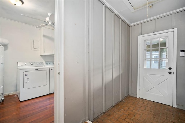 washroom with brick floor, cabinet space, attic access, a ceiling fan, and independent washer and dryer