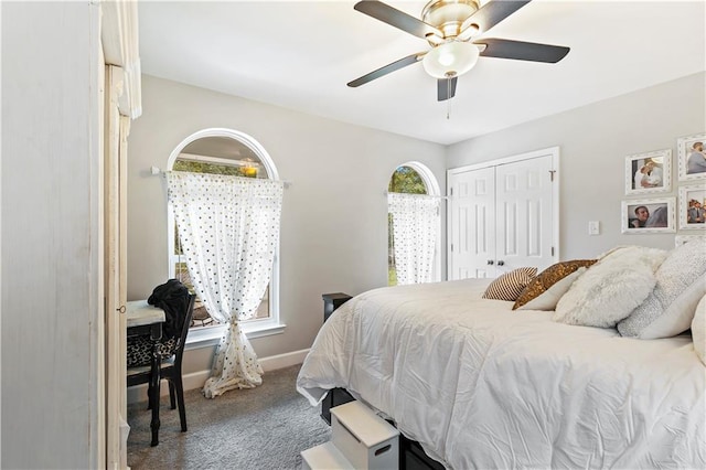 bedroom featuring a closet, ceiling fan, and carpet flooring