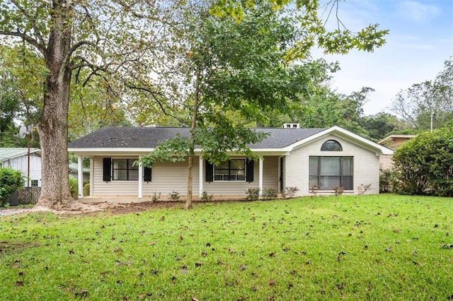 ranch-style home with a front yard