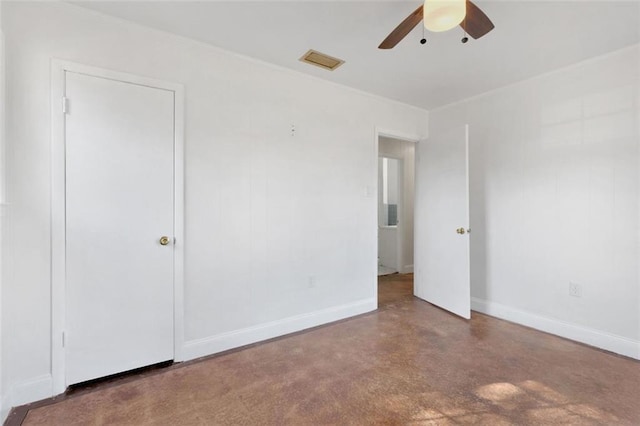 unfurnished room featuring ceiling fan