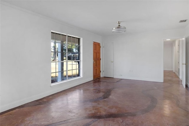 spare room with concrete floors