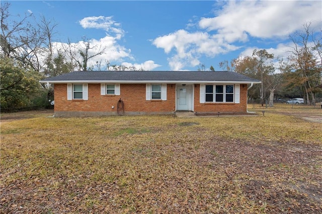 ranch-style house with a front yard