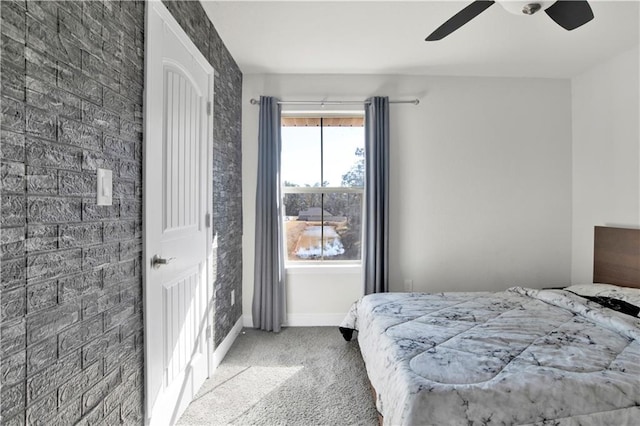 bedroom featuring ceiling fan and light colored carpet