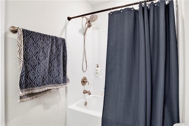 bathroom featuring shower / bath combo