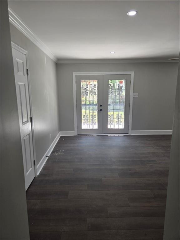 2253 Downs Ct, Mobile, AL 36617 - spare room with baseboards, ornamental molding, french doors, and dark wood-type flooring