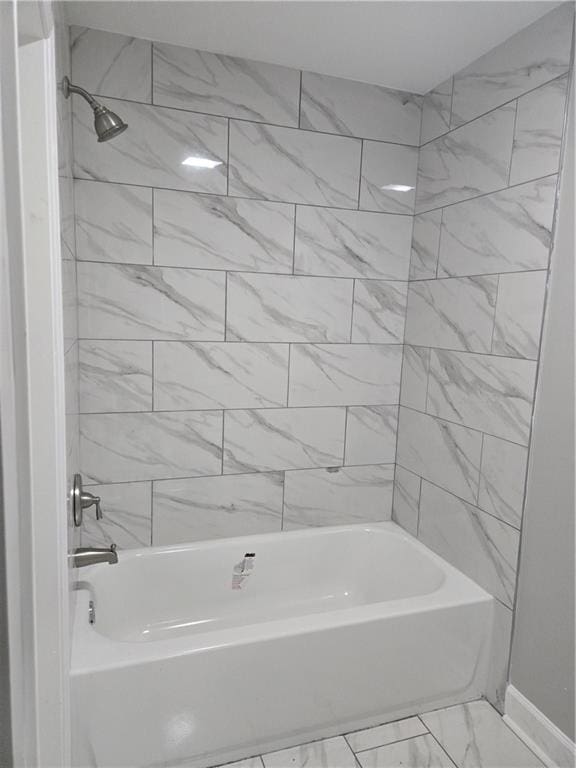 2253 Downs Ct, Mobile, AL 36617 - full bathroom featuring baseboards, marble finish floor, and washtub / shower combination