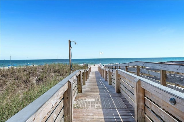 surrounding community featuring a water view