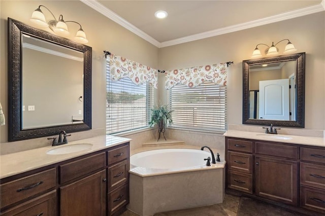 9106 Labrador Trl S, Theodore, AL 36582 - full bath with a sink, ornamental molding, a garden tub, and two vanities
