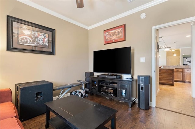 9106 Labrador Trl S, Theodore, AL 36582 - living room featuring baseboards, ornamental molding, a ceiling fan, and wood finished floors