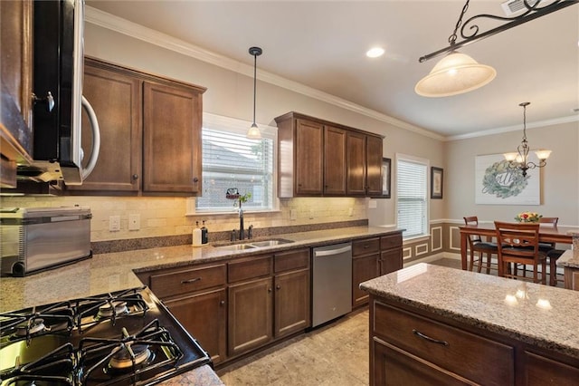 9106 Labrador Trl S, Theodore, AL 36582 - kitchen with tasteful backsplash, stainless steel dishwasher, a sink, black range with gas stovetop, and ornamental molding