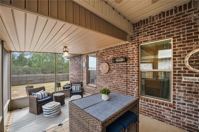 exterior space with fence and an outdoor living space