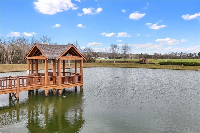 dock area with a water view and a gazebo