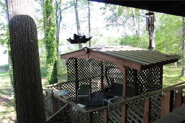 wooden terrace with a gazebo