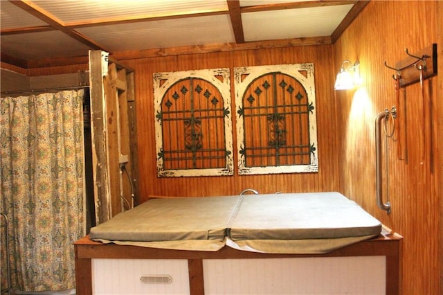 interior space featuring wood walls