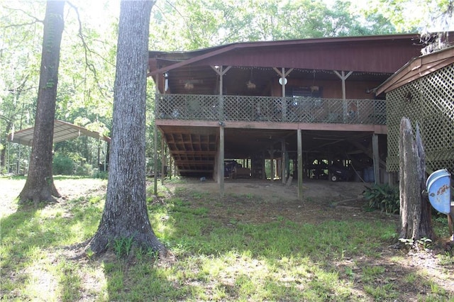 view of outbuilding featuring a carport