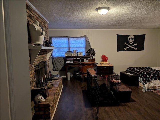 interior space featuring hardwood / wood-style floors, a fireplace, and a textured ceiling