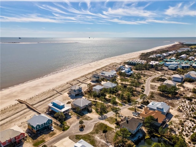 bird's eye view with a beach view and a water view