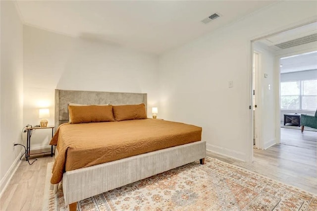 2711 Briley St, Mobile, AL 36606 - bedroom featuring light wood-type flooring and baseboards
