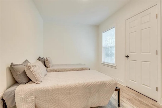 2711 Briley St, Mobile, AL 36606 - bedroom with light wood-style flooring