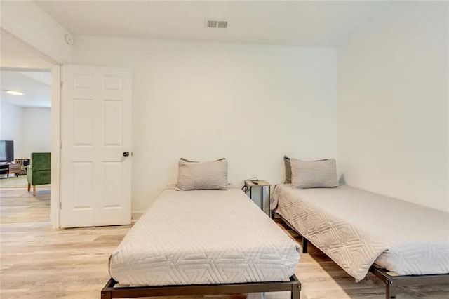 2711 Briley St, Mobile, AL 36606 - bedroom featuring light wood-style flooring