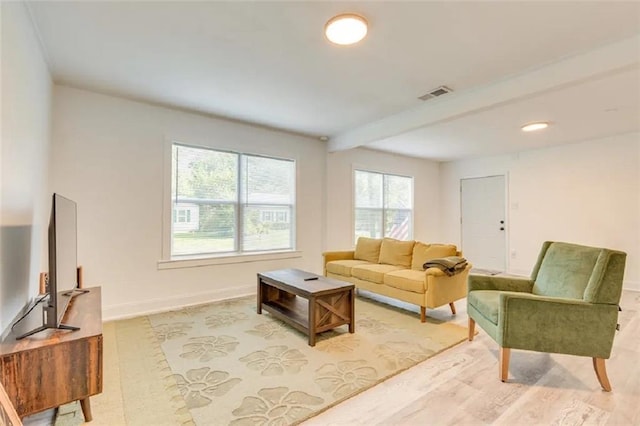 2711 Briley St, Mobile, AL 36606 - living room featuring light wood finished floors, beam ceiling, and recessed lighting