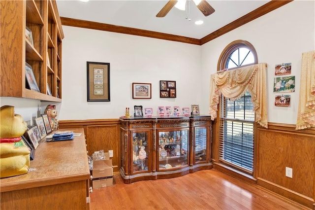 office space with ceiling fan, hardwood / wood-style flooring, and ornamental molding