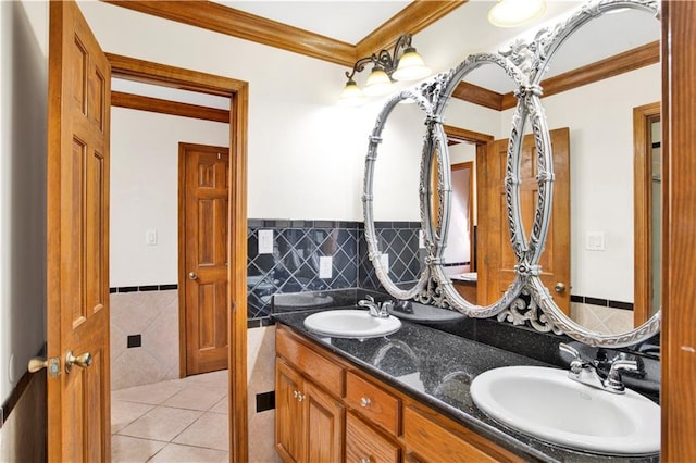 bathroom with vanity, crown molding, tile patterned floors, and tile walls