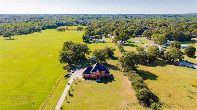 birds eye view of property featuring a rural view