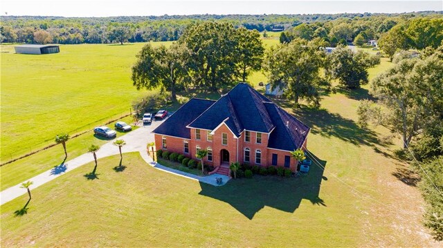 birds eye view of property featuring a rural view