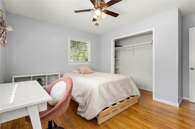 317 Syracuse St, Mobile, AL 36608 - bedroom featuring wood finished floors, a closet, baseboards, and ceiling fan