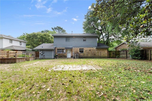 317 Syracuse St, Mobile, AL 36608 - rear view of house featuring brick siding and central air condition unit