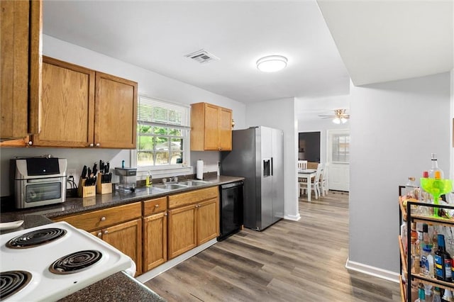 317 Syracuse St, Mobile, AL 36608 - kitchen with dishwasher, stainless steel refrigerator with ice dispenser, white electric range oven, a sink, and light wood-style flooring