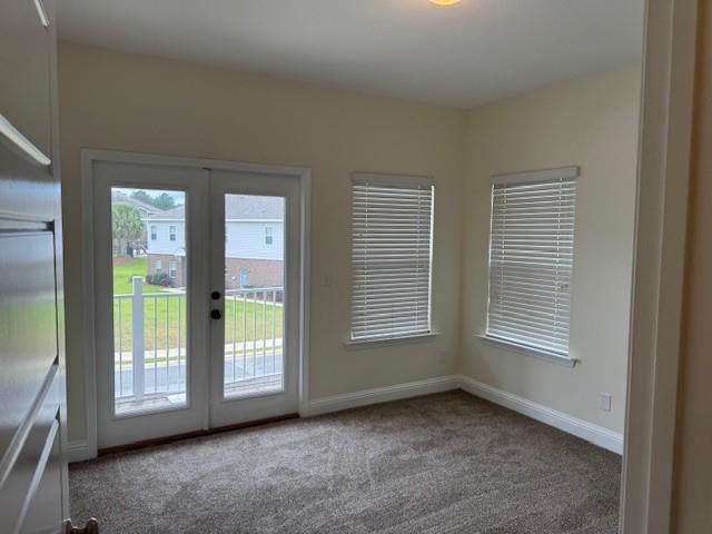 6857 Spaniel Dr Unit A, Daphne, AL 36527 - doorway to outside with french doors, carpet, and baseboards