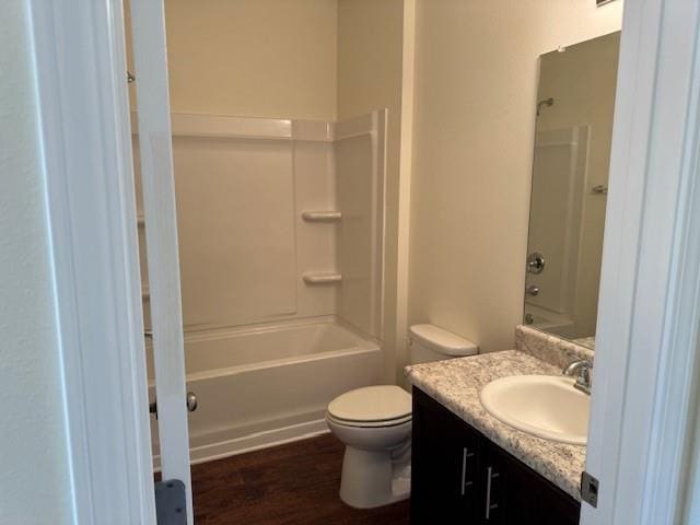 6857 Spaniel Dr Unit A, Daphne, AL 36527 - bathroom with vanity, toilet, bathtub / shower combination, and wood finished floors