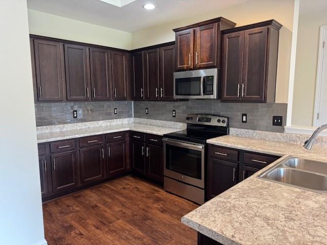 6857 Spaniel Dr Unit A, Daphne, AL 36527 - kitchen with appliances with stainless steel finishes, a sink, light countertops, and recessed lighting