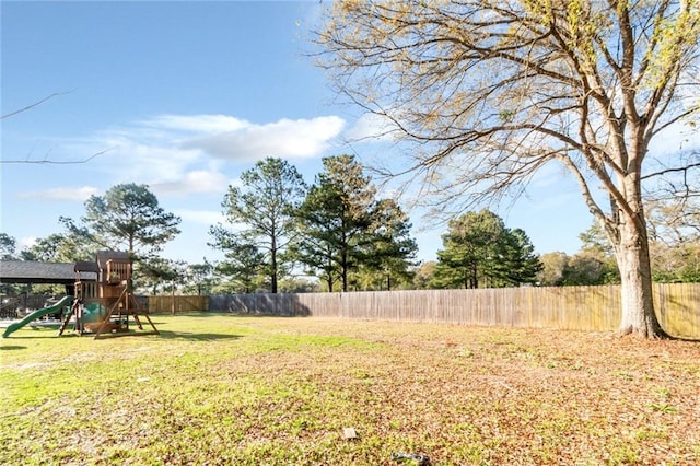 view of yard featuring a playground