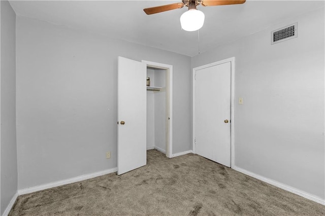 1259 Marietta Dr W, Mobile, AL 36618 - unfurnished bedroom featuring carpet, a closet, and a ceiling fan