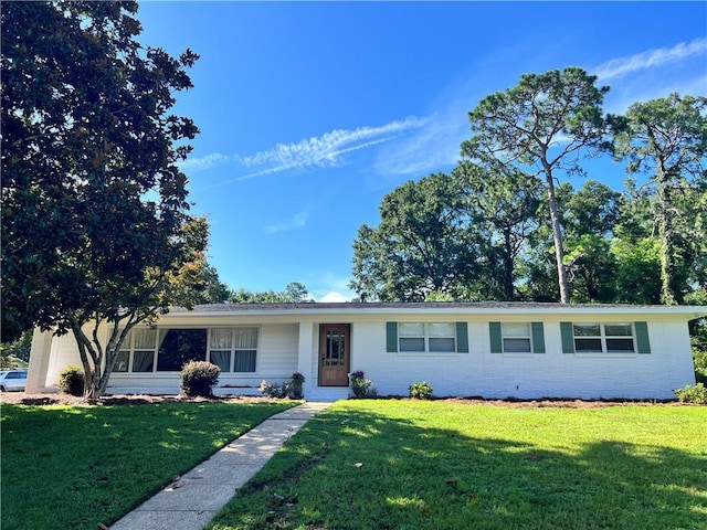 4457 Suzanne Cir, Mobile, AL 36608 - ranch-style house with a front lawn and brick siding