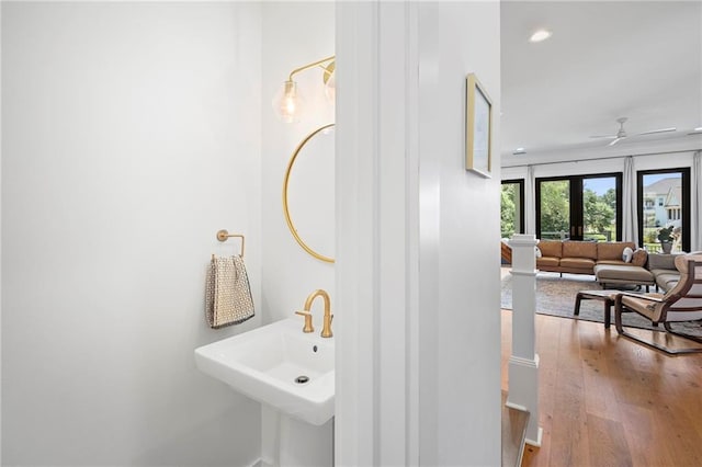313 Cuban Lilly Dr, Fairhope, AL 36532 - bathroom featuring wood finished floors, a sink, a ceiling fan, recessed lighting, and baseboards