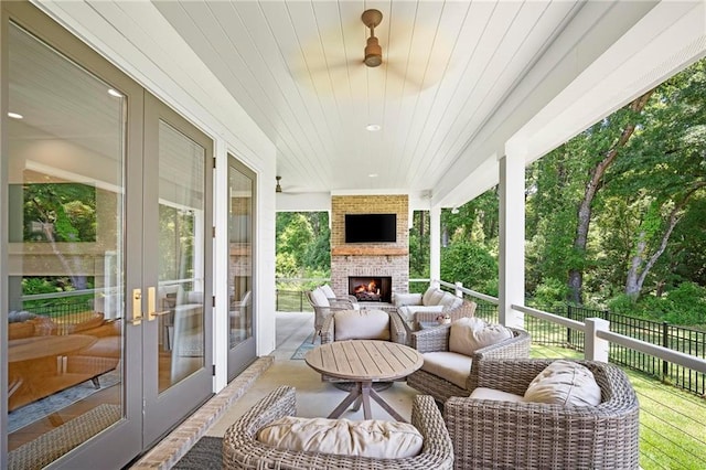 313 Cuban Lilly Dr, Fairhope, AL 36532 - view of patio featuring french doors and an outdoor living space with a fireplace