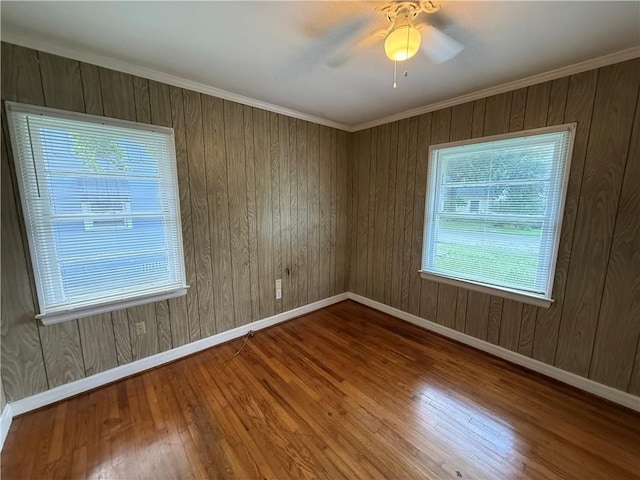 6 Elizabeth Ave, Chickasaw, AL 36611 - spare room with plenty of natural light, ceiling fan, and wood finished floors