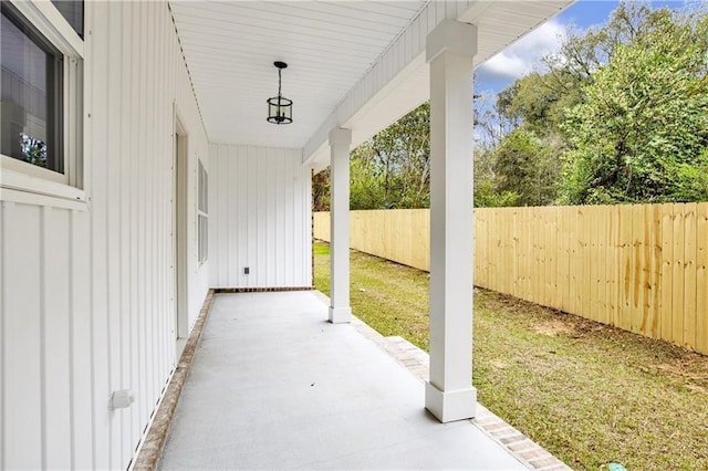 view of patio featuring fence