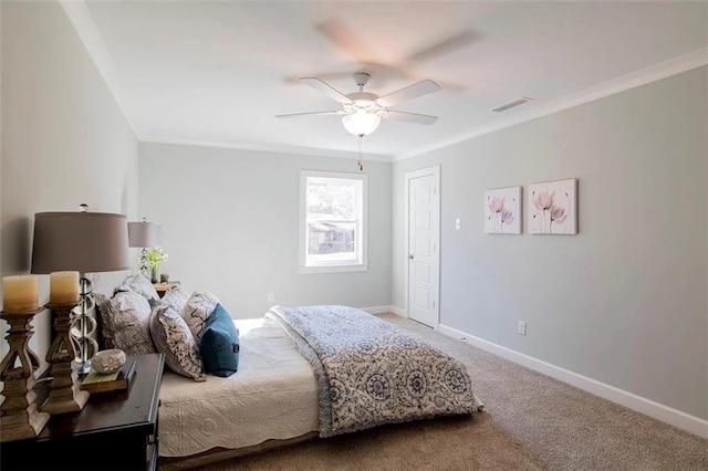 carpeted bedroom featuring ornamental molding and ceiling fan