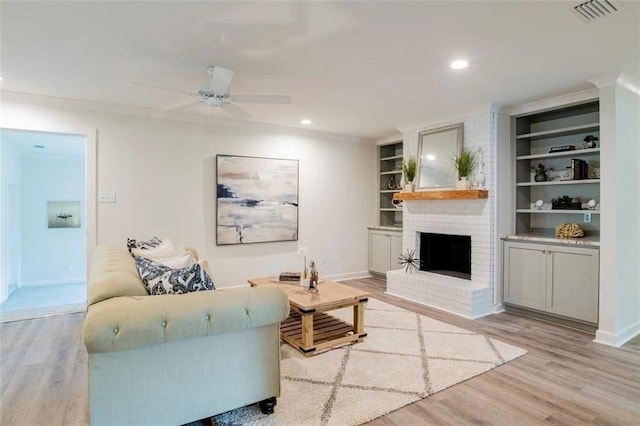 2305 Cedar Ky, Mobile, AL 36695 - living area featuring baseboards, light wood finished floors, and visible vents