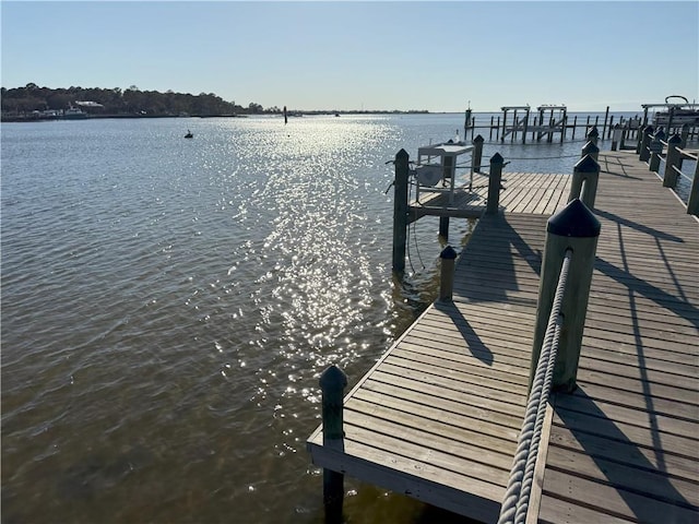 view of dock with a water view