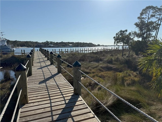 dock area featuring a water view