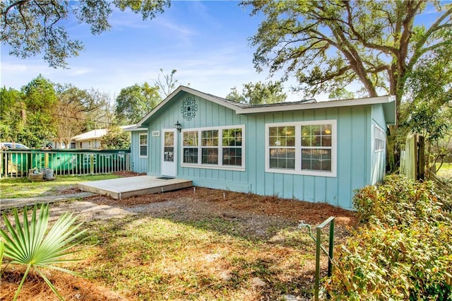 back of property with a patio